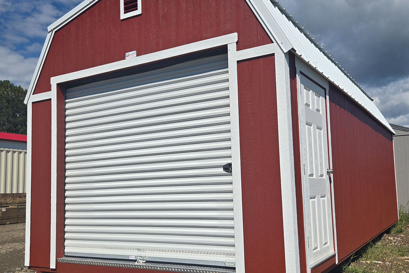 Portable barns with Roll Up Door